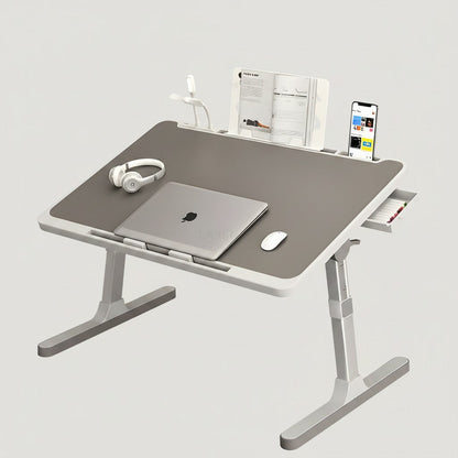 Belro adjustable laptop stand for bed, supporting ergonomic use with a sturdy, portable design suitable for relaxed work.