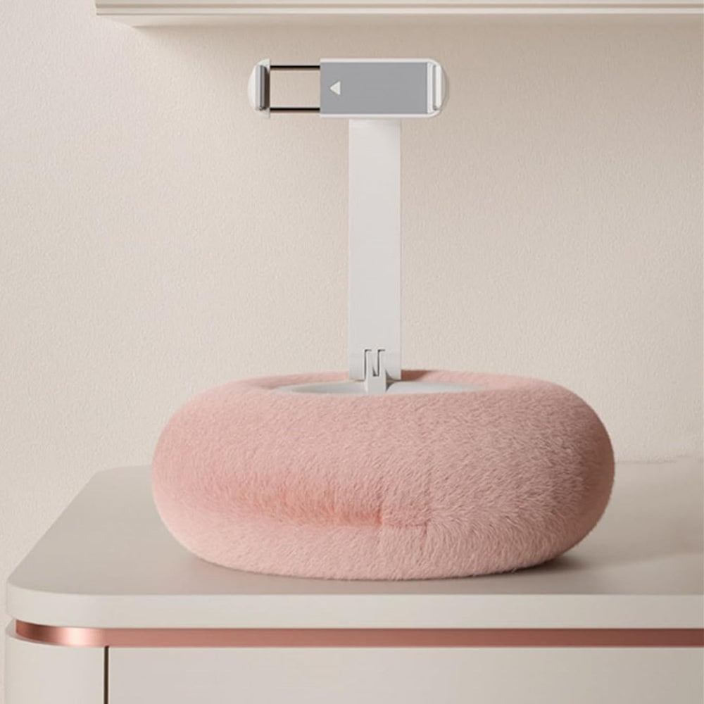 Fuzzy Belro phone holder with built-in snack bowl, portable and soft, designed to keep your phone and snacks accessible.