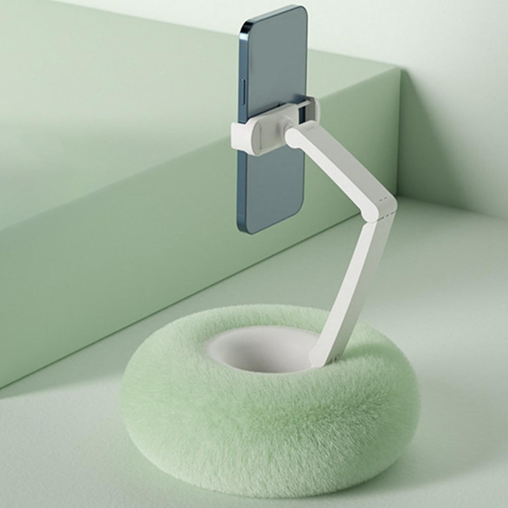 Fuzzy Belro phone holder with snack bowl attachment, soft plush material, designed for hands-free use and snack convenience.