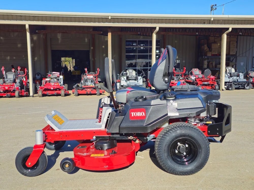 Toro 42-inch TimeCutter MyRide zero-turn mower with 22HP Kohler engine, showcasing the mower's cutting deck and control panel.