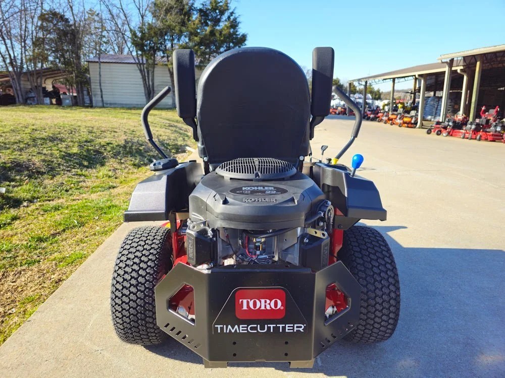 Toro 75747 42-inch TimeCutter MyRide zero-turn mower with 22HP Kohler engine, featuring a wide cutting deck and comfortable seat.