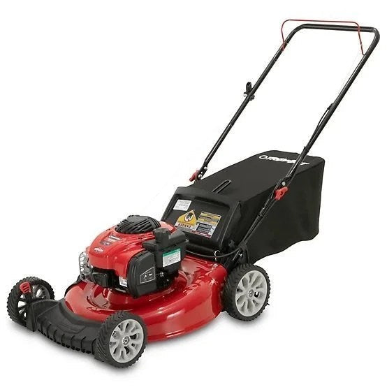 Casavibeo Troy-Bilt 21-inch gas push lawn mower with a metal deck and adjustable cutting height on a grassy lawn.