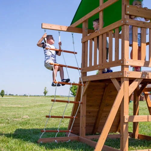 Casavibeo Backyard Discovery Grayson Peak Swing Set with swings, slide, and climbing features in a backyard setting.