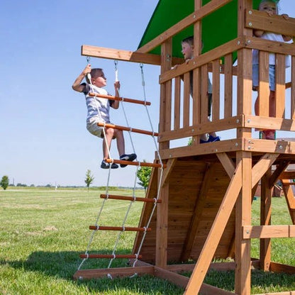 Casavibeo Backyard Discovery Grayson Peak Swing Set with swings, slide, and climbing features in a backyard setting.