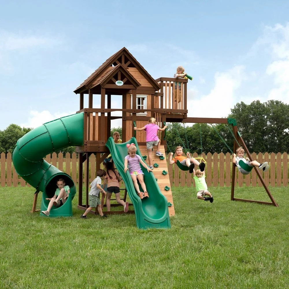 Casavibeo Backyard Discovery Skyfort III swing set with slides, swings, and climbing features in a backyard setting.