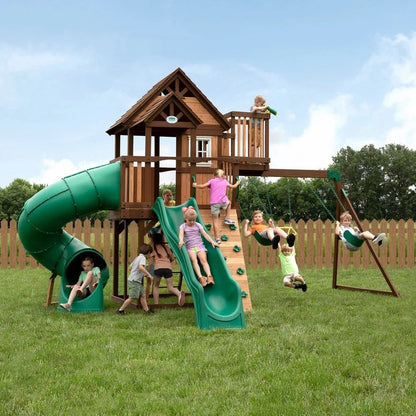 Casavibeo Backyard Discovery Skyfort III swing set with slides, swings, and climbing features in a backyard setting.