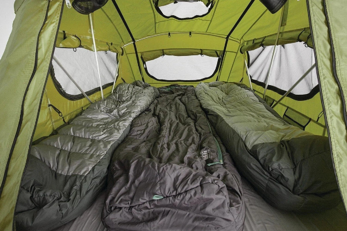 Casavibeo Yakima Skyrise rooftop tent set up on a vehicle, showing its durable fabric, extended ladder, and spacious design.