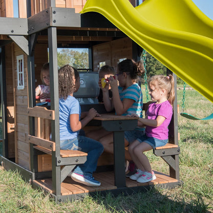 Casavibeo Canyon Creek Swing Set featuring a yellow slide, climbing frame, and safety seats for outdoor kids' play area.