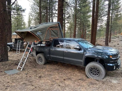 Casavibeo Tuff Stuff Overland Alpha Hard Top Side Open Tent set up on a vehicle for overland camping adventures.