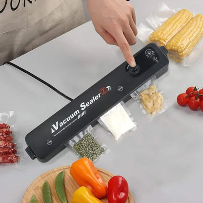 Belro electric food saver vacuum bag sealer machine for kitchen food packaging, with vacuum bags for sealing and storage.