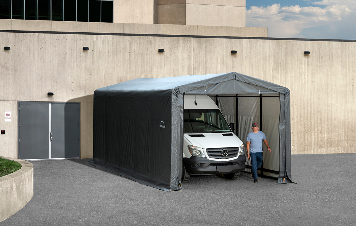 Tan Casavibeo ShelterTube garage, 10x14x8 feet, wind and snow-load rated, shown in a residential outdoor setting.