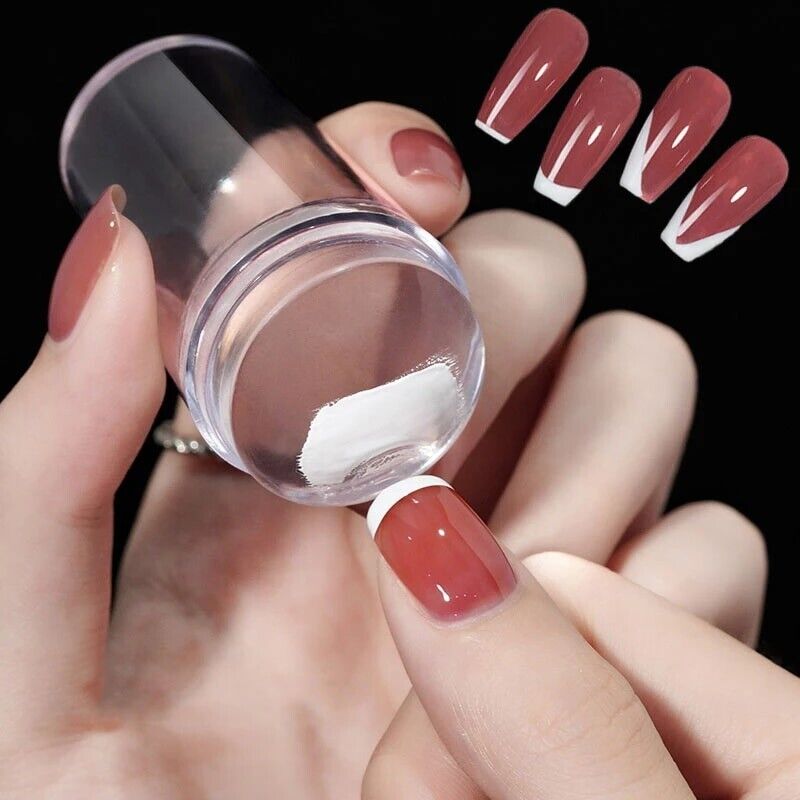 Transparent silicone nail stamper and scraper for detailed nail art and stamping, by Belro for professional nail care.