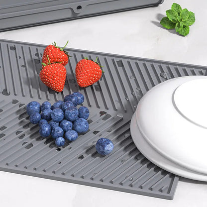 Belro silicone countertop dish drying mat in vibrant color, with textured surface for drying dishes and utensils in kitchen.