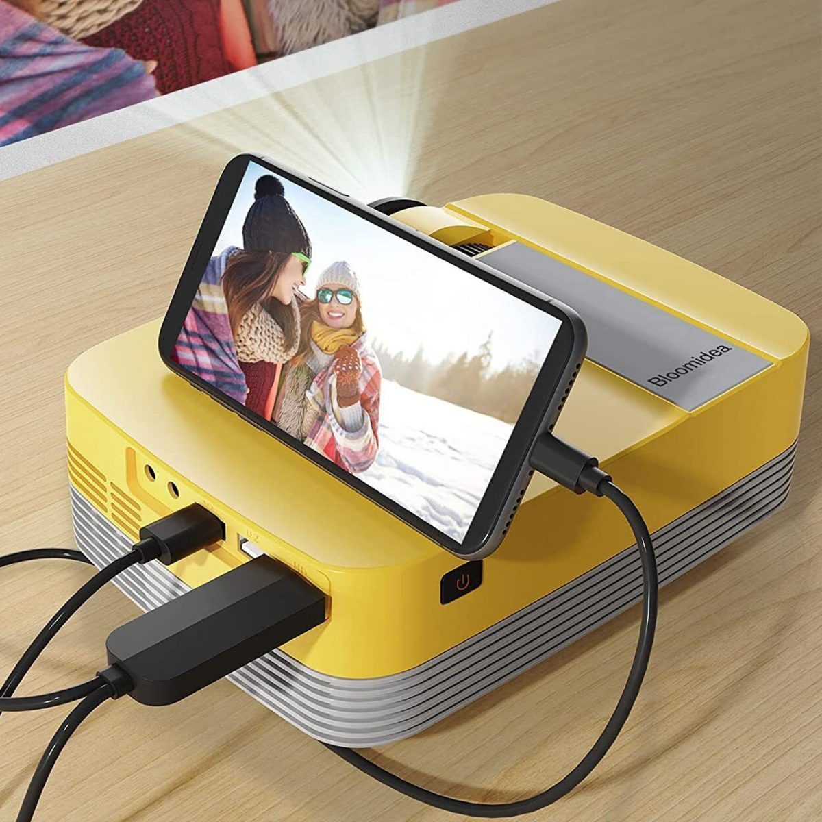 Belro portable HD mini smart USB projector showing a bright image on a wall, compact design ideal for mobile and laptop use.