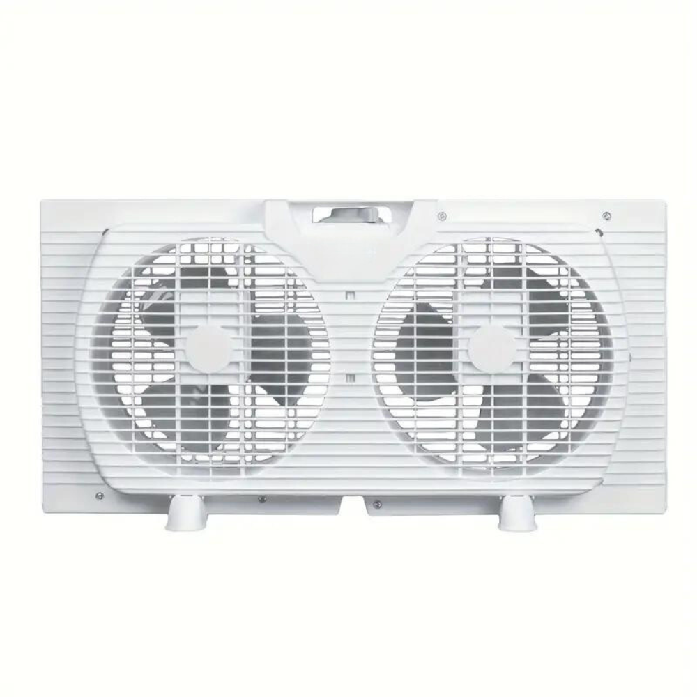 Belro InstaBreeze twin window cooling fan system installed in a home window, providing outdoor air circulation and cooling.