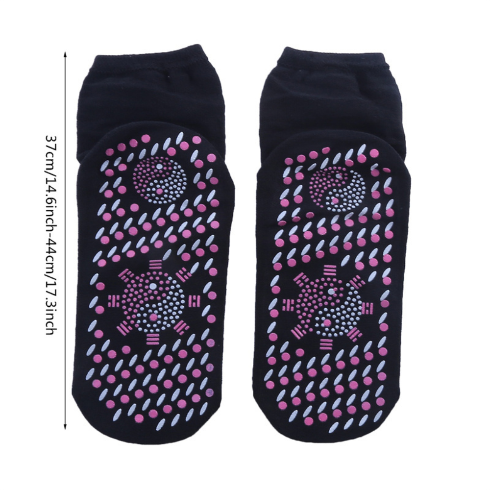 Two pairs of Belro self-heating winter warmer socks, cozy and thick for cold weather, shown in a close-up image.