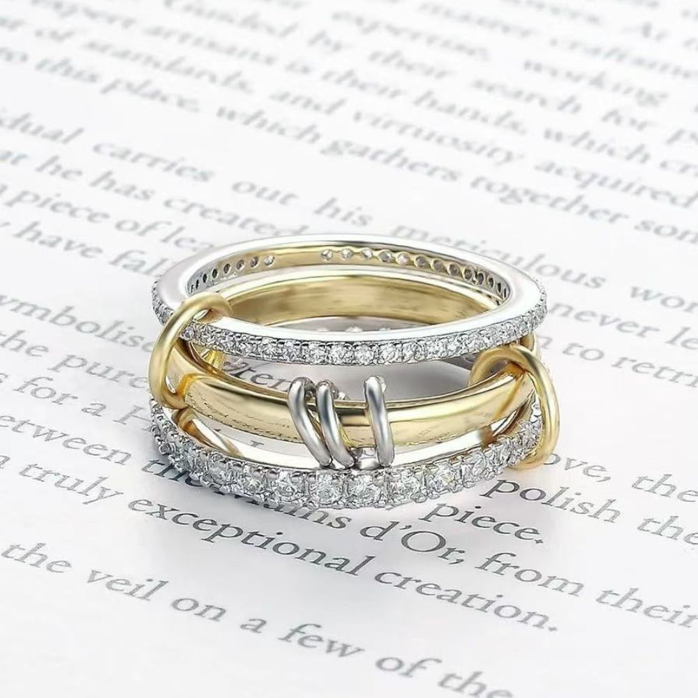 Pair of trendy gold stackable rings from Belro, showcasing sleek, modern jewelry design for stylish accessories.