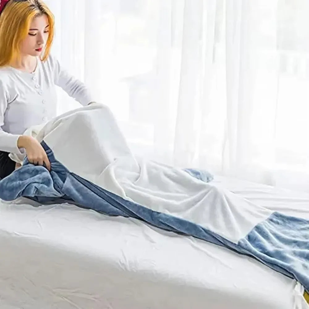 Belro soft flannel shark hoodie blanket draped over a bed, featuring a cozy hood with shark details and plush fabric for sleepwear comfort.