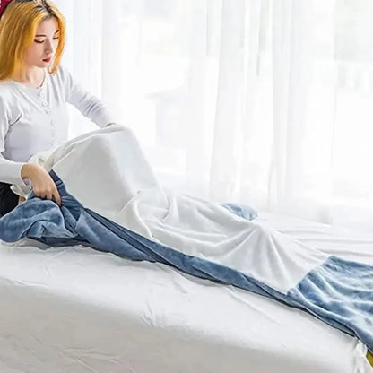 Belro soft flannel shark hoodie blanket draped over a bed, featuring a cozy hood with shark details and plush fabric for sleepwear comfort.