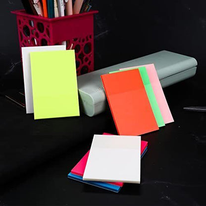 Clear transparent sticky notes from Belro, showing a stack of adhesive notes on a desk for office and stationery use.