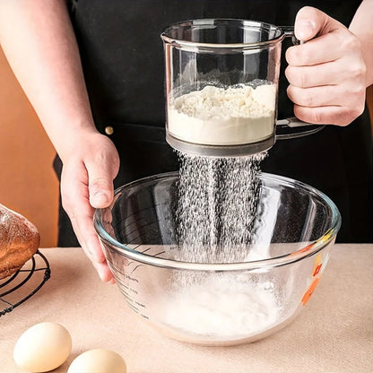 Mivoza flour sifter with squeeze handle and 250ml capacity, used for baking and sifting flour in kitchen baking tools.