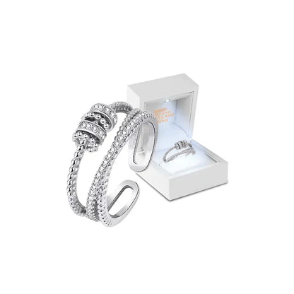 Belro Threanic Triple-Spin Ring, silver-toned jewelry accessory with a three-layer spinning design for stylish wear.