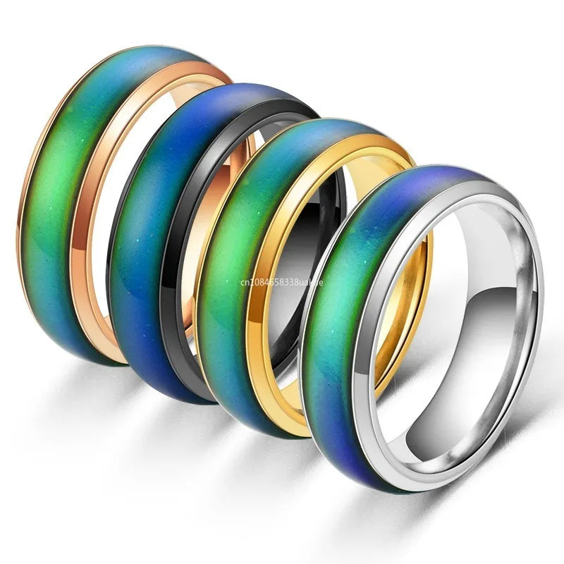 Stainless steel mood ring from Belro, showing a reflective, colorful gemstone set in a sleek silver band.