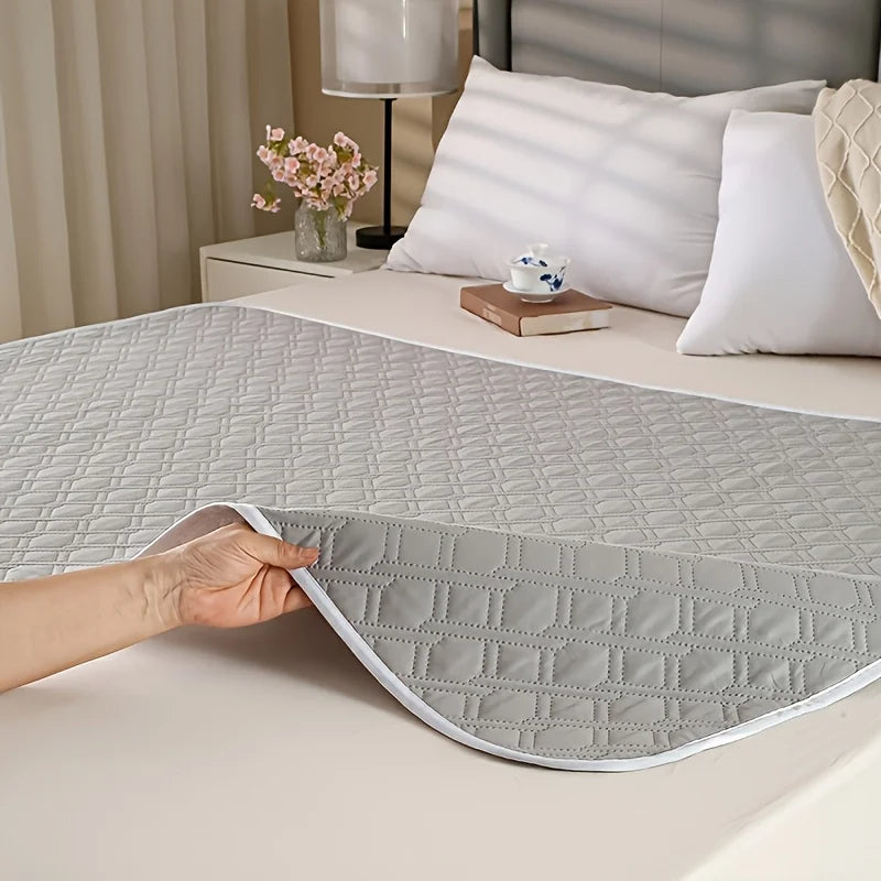 Belro washable incontinence bed protector laid flat, showing soft waterproof fabric designed for health and bed protection.