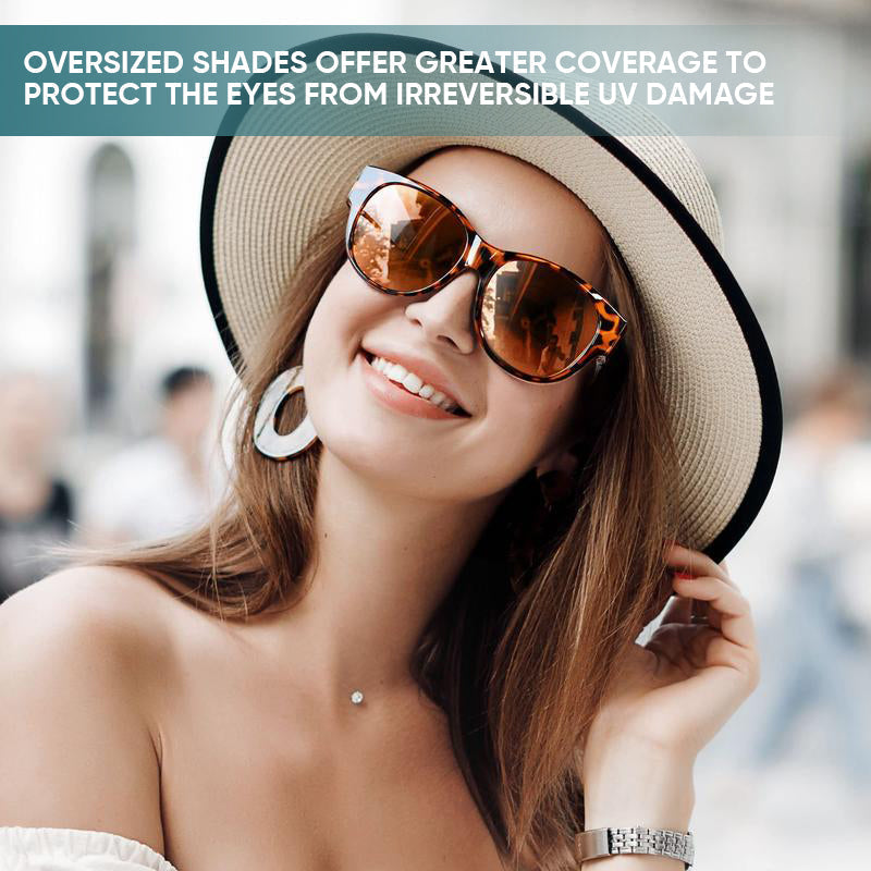 BowLift Fit-Over Polarised UV400 sunglasses with wraparound design worn over glasses, providing sun protection and clear vision.