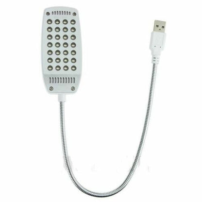 Belro Portability Laptop Light attached to a laptop, providing focused illumination for office and stationery use.