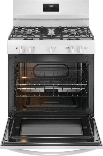 Casavibeo Frigidaire 30-inch gas range with four burners and oven, stainless steel finish, and control knobs.