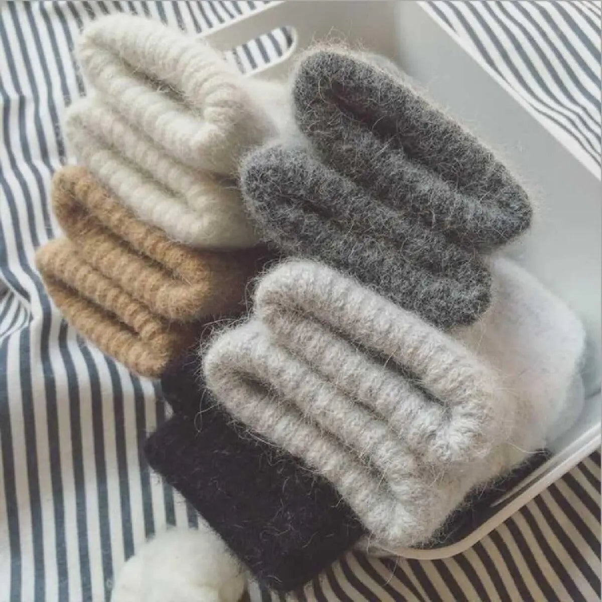 Belro women's cashmere knit winter mittens, soft and warm, showing the cozy, textured fabric and classic design.