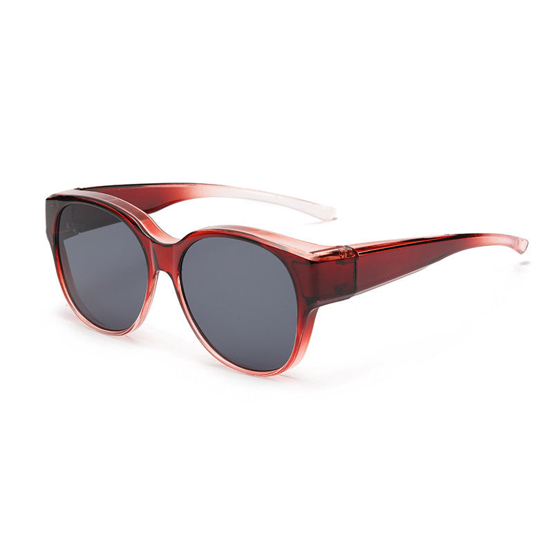 BowLift Fit-Over Sunglasses with polarised UV400 lenses, wraparound design, worn over glasses, suitable for outdoor sun protection.