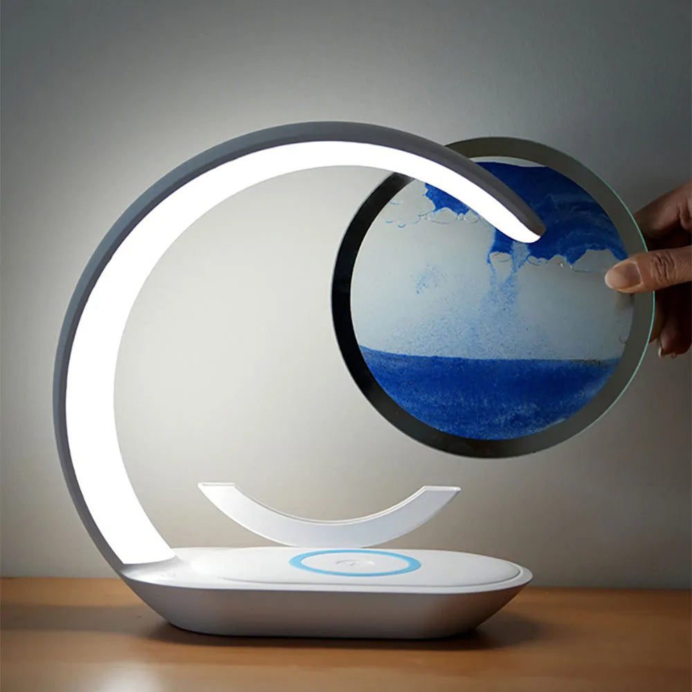 Belro 3D Sand Art Table Lamp with wireless charger showing illuminated sand art and sleek modern design in a home setting.