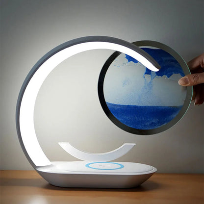 Belro 3D Sand Art Table Lamp with wireless charger showing illuminated sand art and sleek modern design in a home setting.