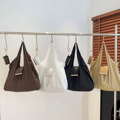 Belro mini foldable tote bag keychain accessory in compact design with wallet and card holder features.