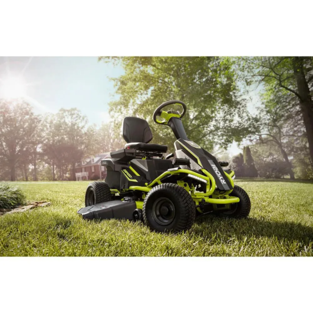 Casavibeo RYOBI 38-inch 100Ah battery electric rear engine riding lawn mower shown outdoors, with cutting deck and ergonomic controls