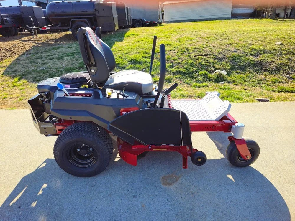 Toro 75747 42-inch TimeCutter MyRide zero-turn mower with 22HP Kohler engine, featuring a comfortable seat and large cutting deck.