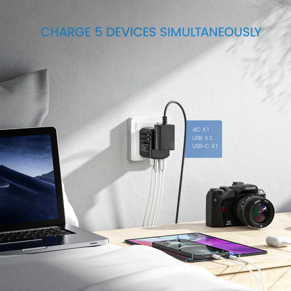 Belro multi-port travel adapter with three USB ports and universal plug for international travel compatibility.