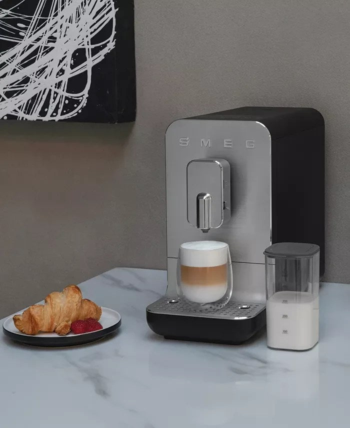 Casavibeo Smeg Bean to Cup Coffee Machine BCC13EGMUK with stainless steel finish and digital control panel.