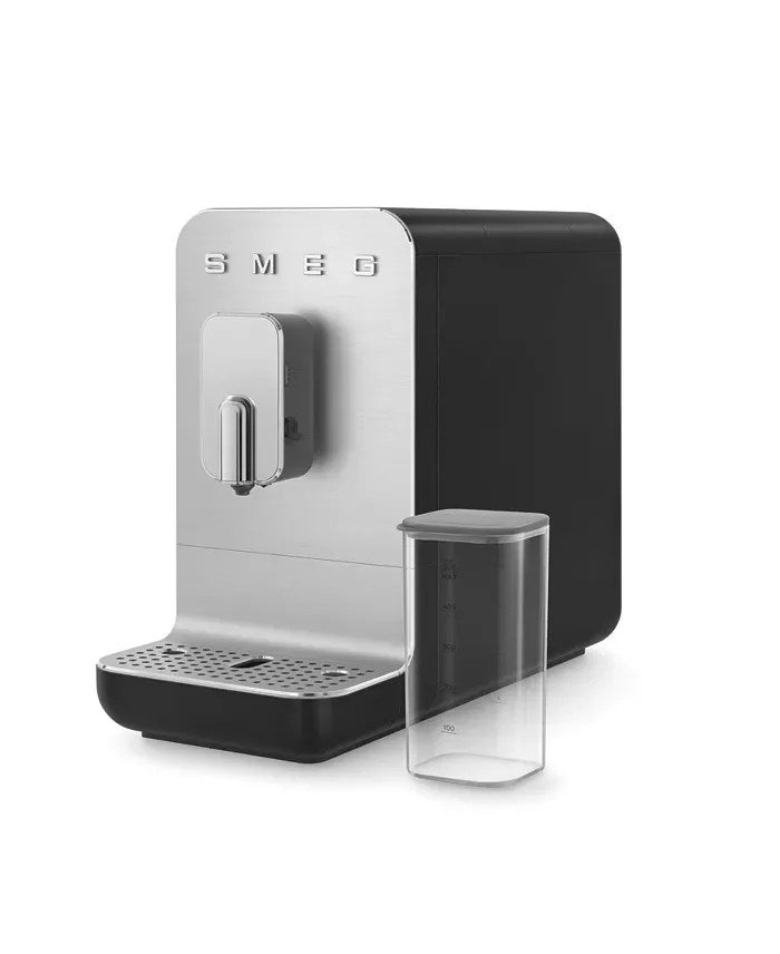 Casavibeo Smeg Bean to Cup Coffee Machine BCC13EGMUK with stainless steel finish and digital controls, brewing fresh coffee.