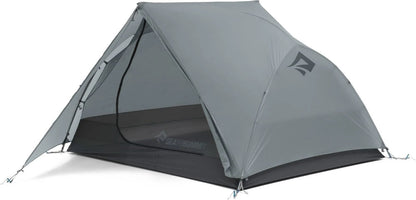 Sea to Summit Telos TR3 Tent set up outdoors, showing lightweight camping tent with rainfly and mesh walls for ventilation.