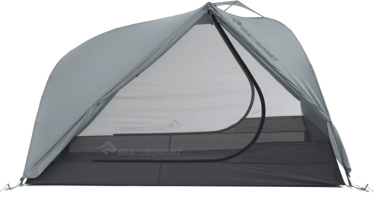 Sea to Summit Telos TR3 tent set up outdoors with rainfly and mesh panels, showcasing lightweight camping gear by Casavibeo.