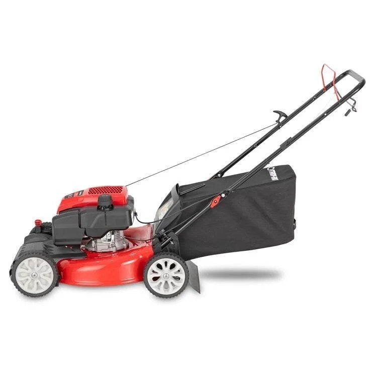 Casavibeo Troy-Bilt TB200C self-propelled lawn mower with green grass, showing the cutting deck and grass collection bag.