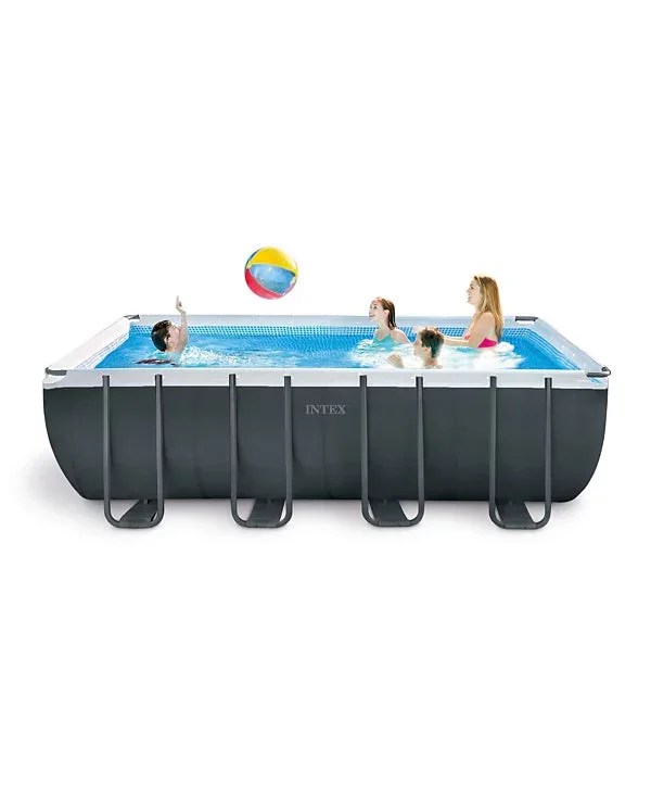 Intex Ultra XTR above ground pool with clear water and a solar cover, set up outdoors in a backyard.