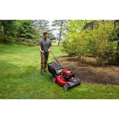 Casavibeo Troy-Bilt TB200C self-propelled lawn mower with a green cutting deck and handle, ready for yard work.