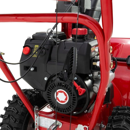 Casavibeo Troy-Bilt Storm 2600 26-inch gas snow blower with electric start and two-stage 208cc engine, ready for winter snow removal.