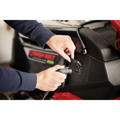 Casavibeo Troy-Bilt Super Bronco 42E XP electric riding lawn tractor with 42-inch cutting deck and 56V lithium-ion battery.