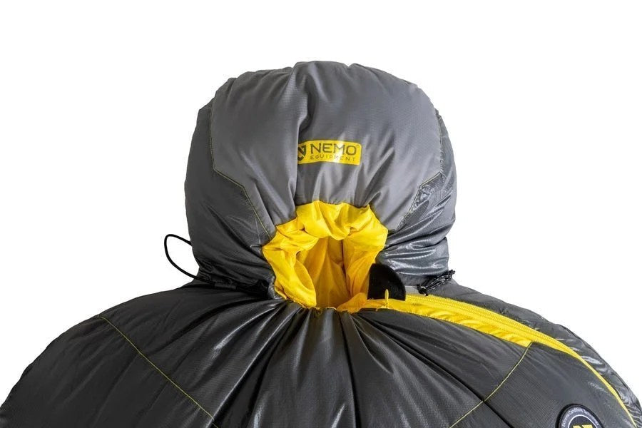 Casavibeo NEMO Sonic sleeping bag spread open, showing its insulated fabric and adjustable hood for outdoor camping comfort.