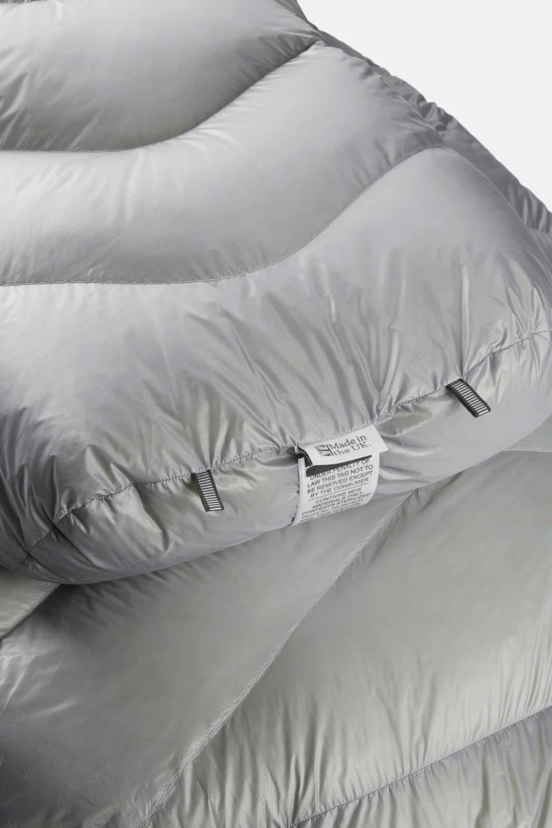 Casavibeo Rab Mythic 600 Down Sleeping Bag laid out, showing its lightweight, insulated design ideal for camping and outdoor adventures.